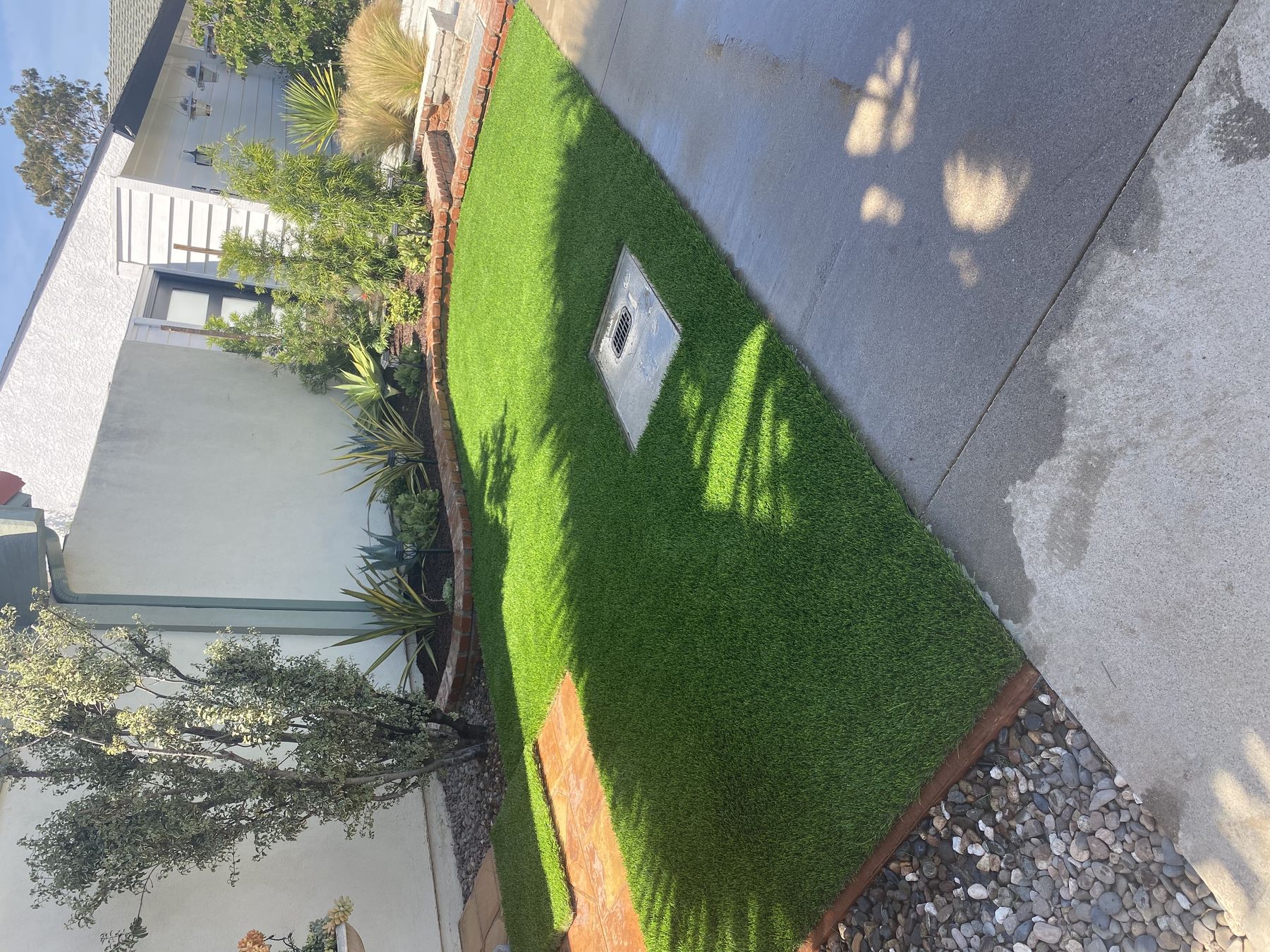 Artificial turf front lawn on a Southern California property installed by 3RS Landscaping